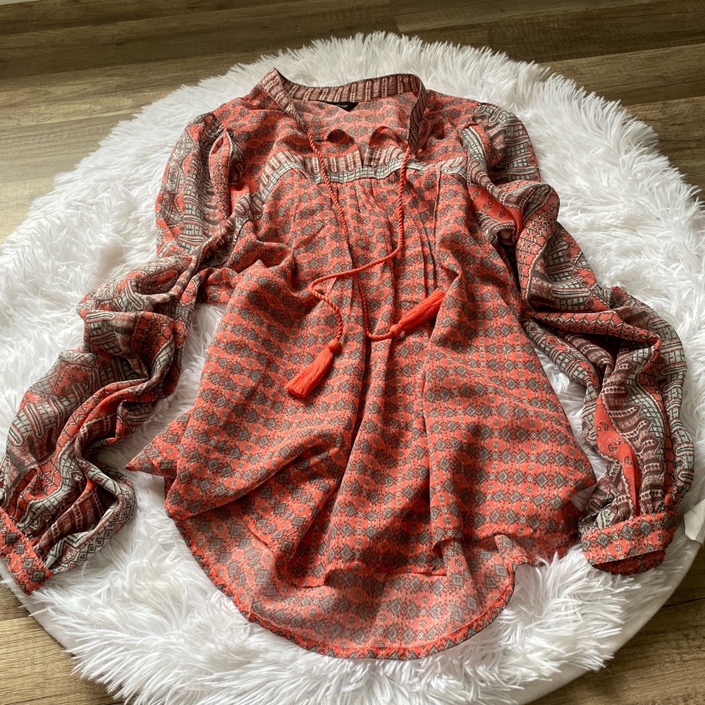 Lucky size medium long sleeve blouse.